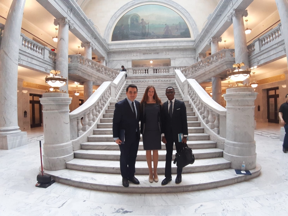 Ms. Mozghova (center) with her fellow participants at the Utah capital