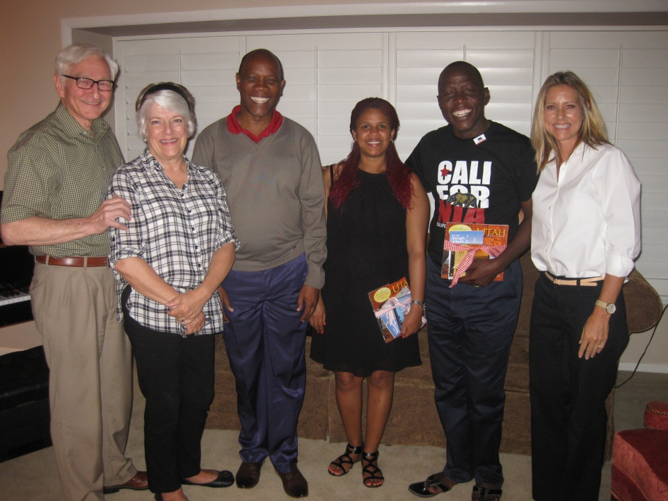Hanning Mutukiriza and International Visitors with Home Hospitality Hosts
